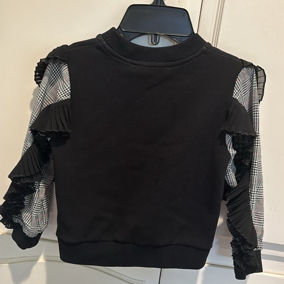 Givanchy sweater size 4 kids black with raffles on sleeves and logo in front - Picture 4 of 6